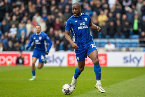 Yakou Meite of Cardiff City attacks during a soccer match.