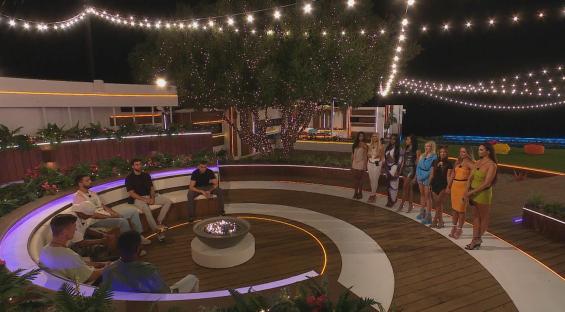 Love Island contestants at a firepit; Molly and Zachariah share a kiss.