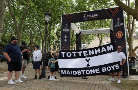 Tottenham Hotspur fans in Bilbao holding a banner before the Europa League final.