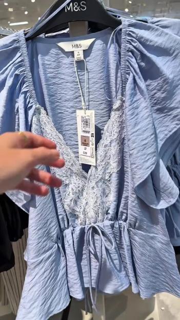 Light blue M&S blouse with white lace detail.
