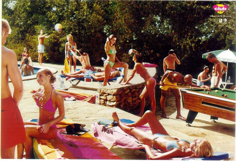 Advertisement for Club 18-30 holidays showing young adults at a poolside party.