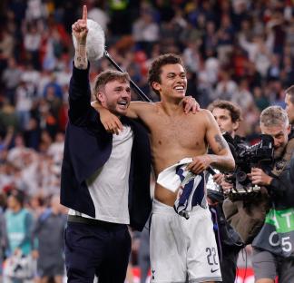 James Maddison and Brennan Johnson of Tottenham Hotspur celebrating their Europa League victory.