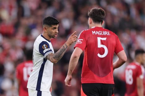 Harry Maguire of Manchester United reacts to a Tottenham Hotspur player.