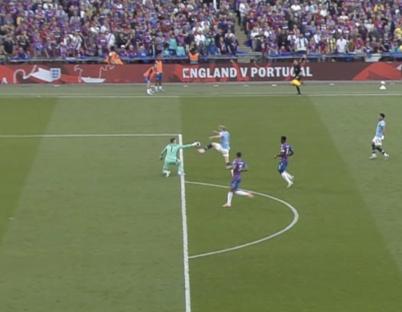 Soccer game, England vs Portugal. A goalkeeper makes a save.