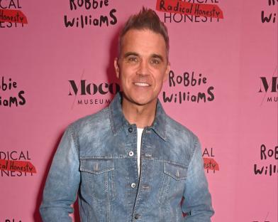 Robbie Williams at the opening of his art exhibition,
