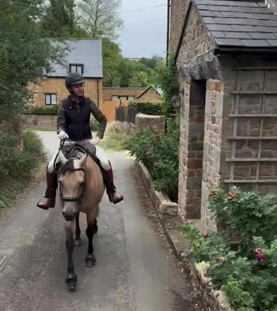 Ellen DeGeneres horseback riding.
