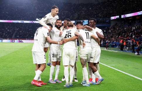 OGC Nice soccer players celebrating a goal.