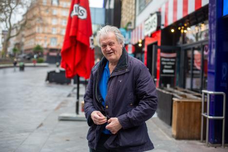 Sir Tim Martin leaving LBC after an interview.