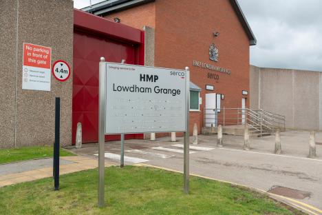 HMP Lowdham Grange prison entrance sign.