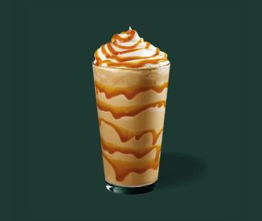 Starbucks Caramel Frappuccino with whipped cream and caramel sauce.