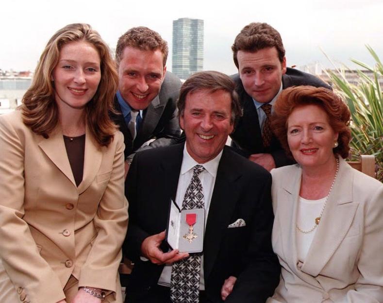 Terry Wogan with his family after receiving an honorary OBE.