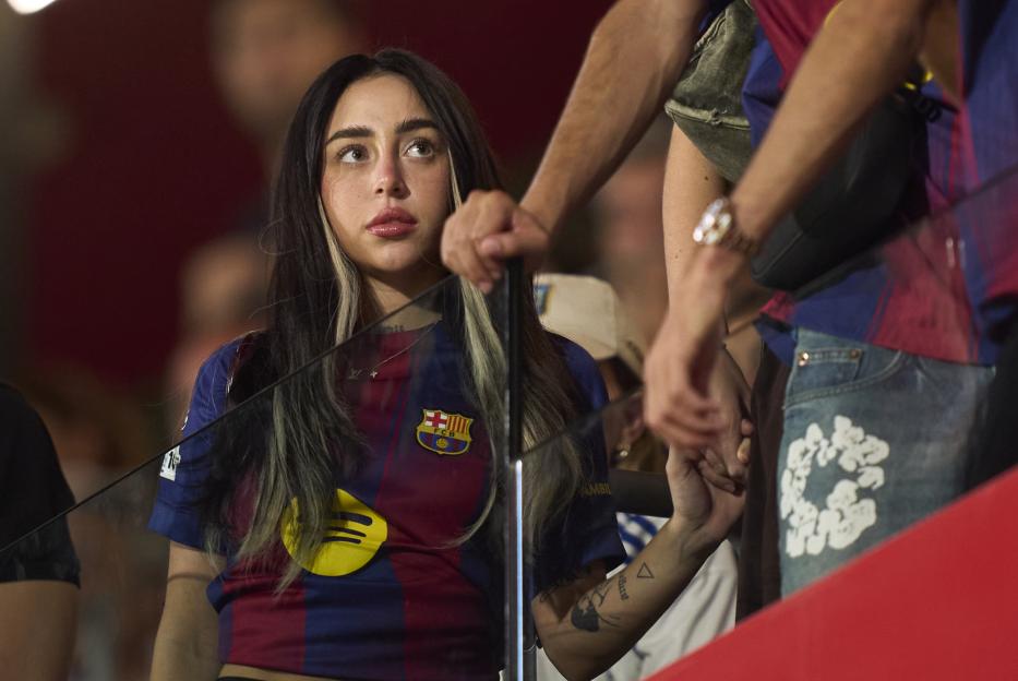 Nicki Nicole at a soccer match wearing an FC Barcelona jersey.