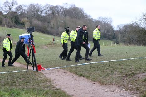 Police investigators at a crime scene.
