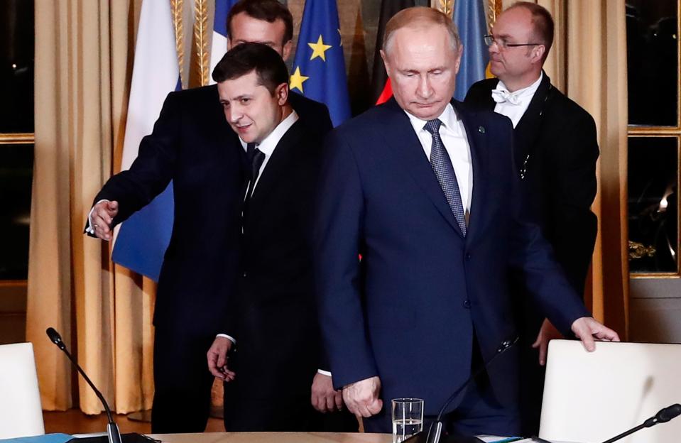 Zelensky and Putin at a meeting in Paris.
