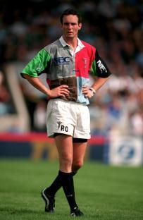 Rugby player in NEC Harlequins uniform.