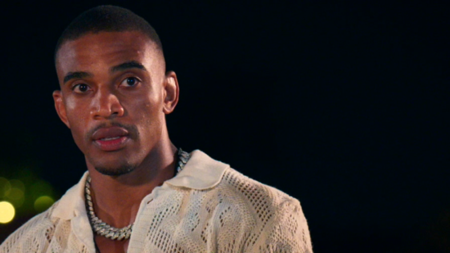 A man with a surprised expression looking at the camera.