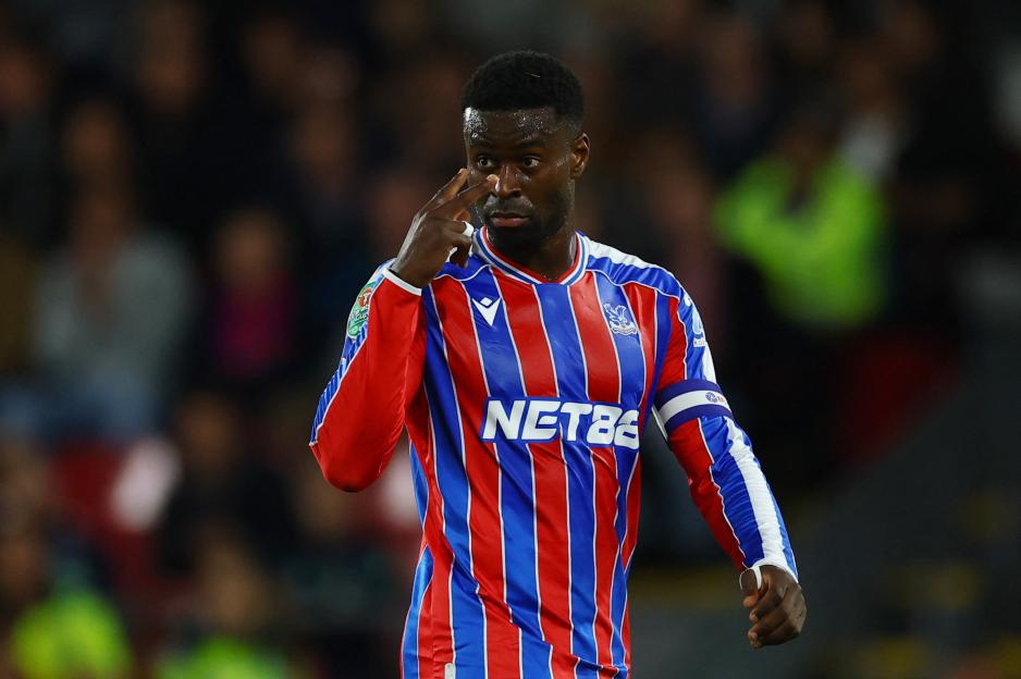 Marc Guehi reacts during a football match.