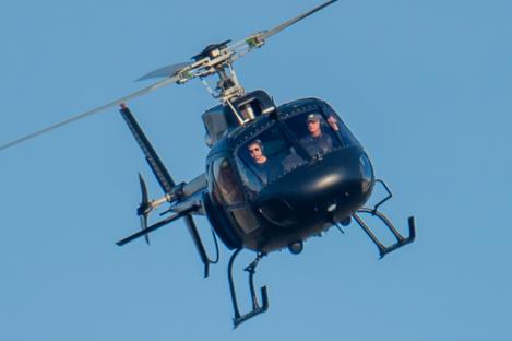 Tom Cruise and Christopher McQuarrie in a helicopter.