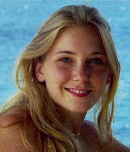Portrait of a young woman with long blond hair.