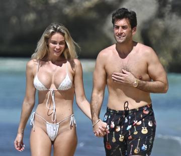 James Argent and his girlfriend on a beach vacation.