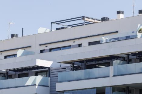 Modern apartment building with balconies.