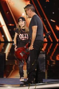 Simon Cowell giving Olly Pearson a Golden Buzzer on Britain's Got Talent.