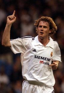 Steve McManaman of Real Madrid celebrating a goal.
