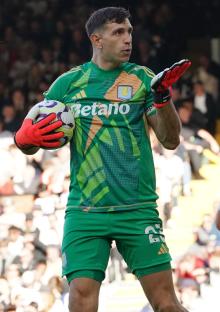 Emiliano MartÃnez of Aston Villa blows a kiss to the fans.