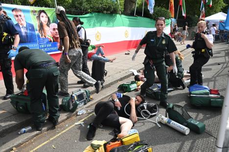 Protesters attacked outside Iranian Embassy in London as six arrested