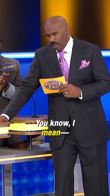 Steve Harvey on Family Feud reacting to a contestant.