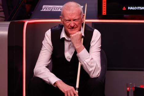 Steve Davis of England reacts during a snooker match.