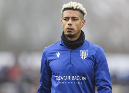 Lyle Taylor of Colchester United at a soccer match.