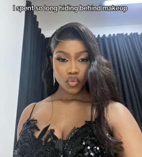Woman in black sequined dress with makeup, caption: