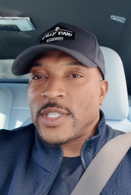 Ashley Walters speaking in a car.