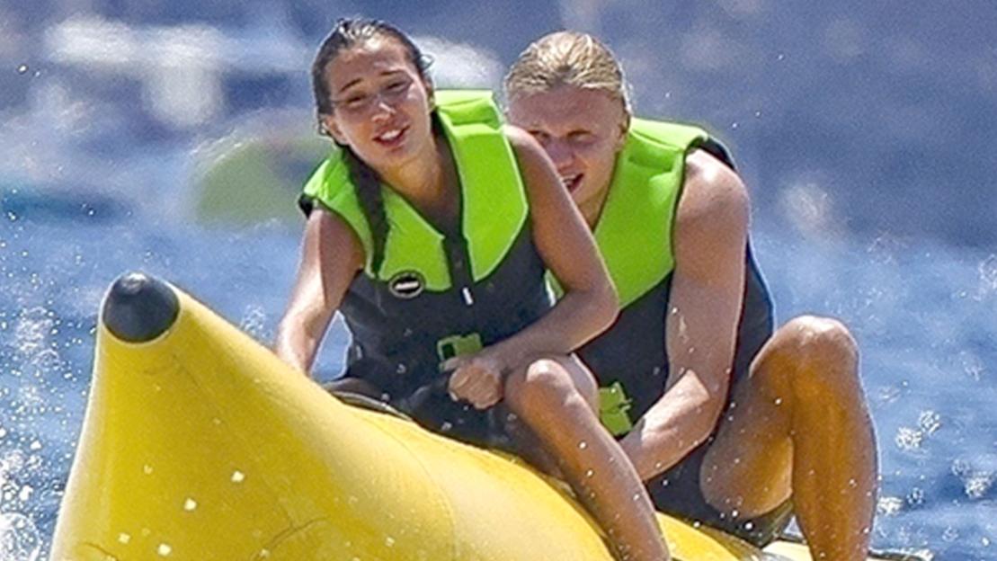 Erling Haaland rides banana boat on Ibiza holiday as Man City star enjoys pre-season break after Club World Cup