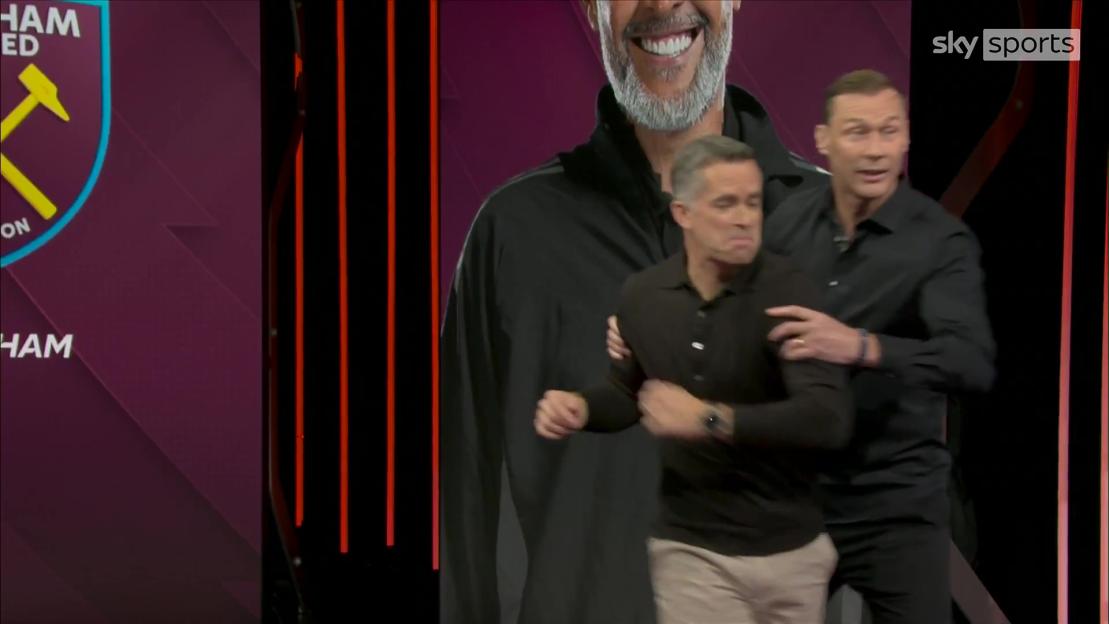 Duncan Ferguson playfully "throws" Dave Jones around the Sky Sports studio.