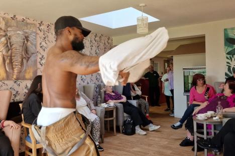 Care home grannies enjoy afternoon tea with a muscle-bound male stripper who had a very strict rule to follow
