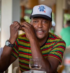 Recaldo Thomas wearing a Pabst Blue Ribbon trucker hat.