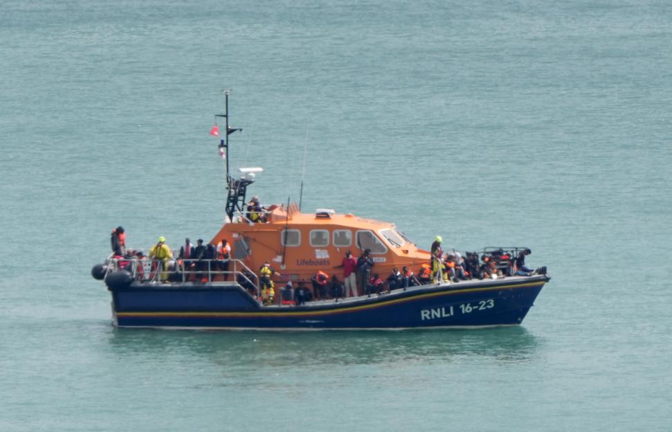 Migrants on an RNLI lifeboat.