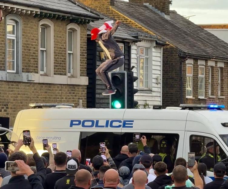Protesters clash with cops outside migrant hotel after asylum seeker appears in court over ‘sexually assaulting’ girl