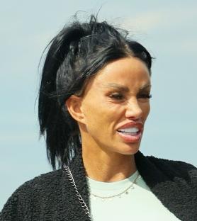 Katie Price walking her dog.