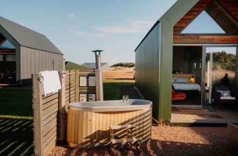 Hot tub outside a lodge.