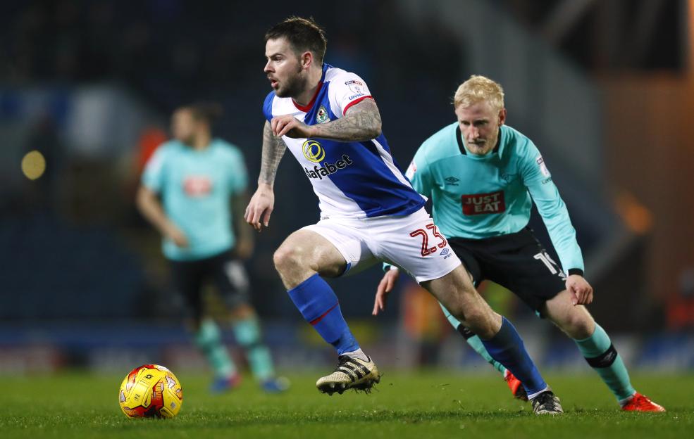 Blackburn Rovers' Danny Guthrie and Derby County's Will Hughes in action.