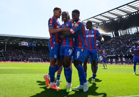 Crystal Palace soccer players celebrating a goal.