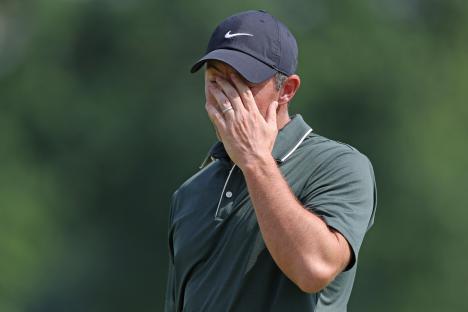 Rory McIlroy of Northern Ireland reacts during a golf tournament.