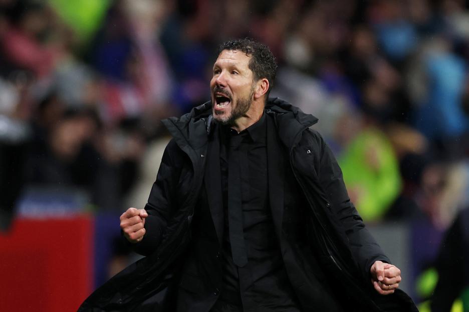 Atlético Madrid head coach Diego Simeone celebrating a victory.