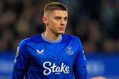 Vitaly Mykolenko of Everton in a blue jersey.