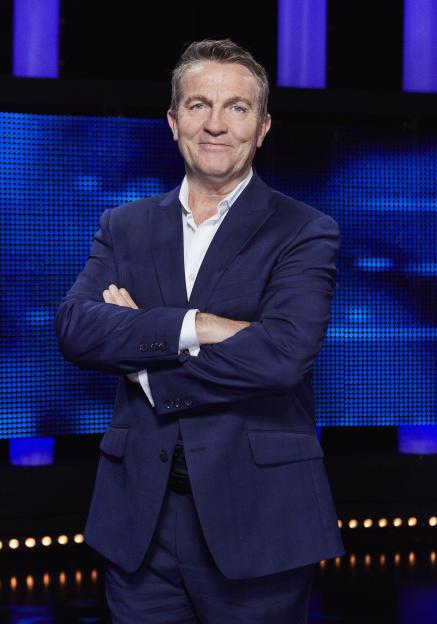 Bradley Walsh, host of The Chase, in a blue suit.