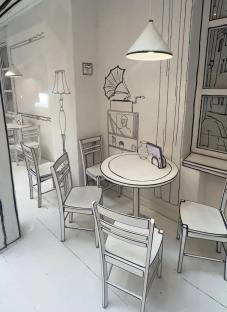 Cartoon-style illustration of a cafe interior with white tables and chairs.