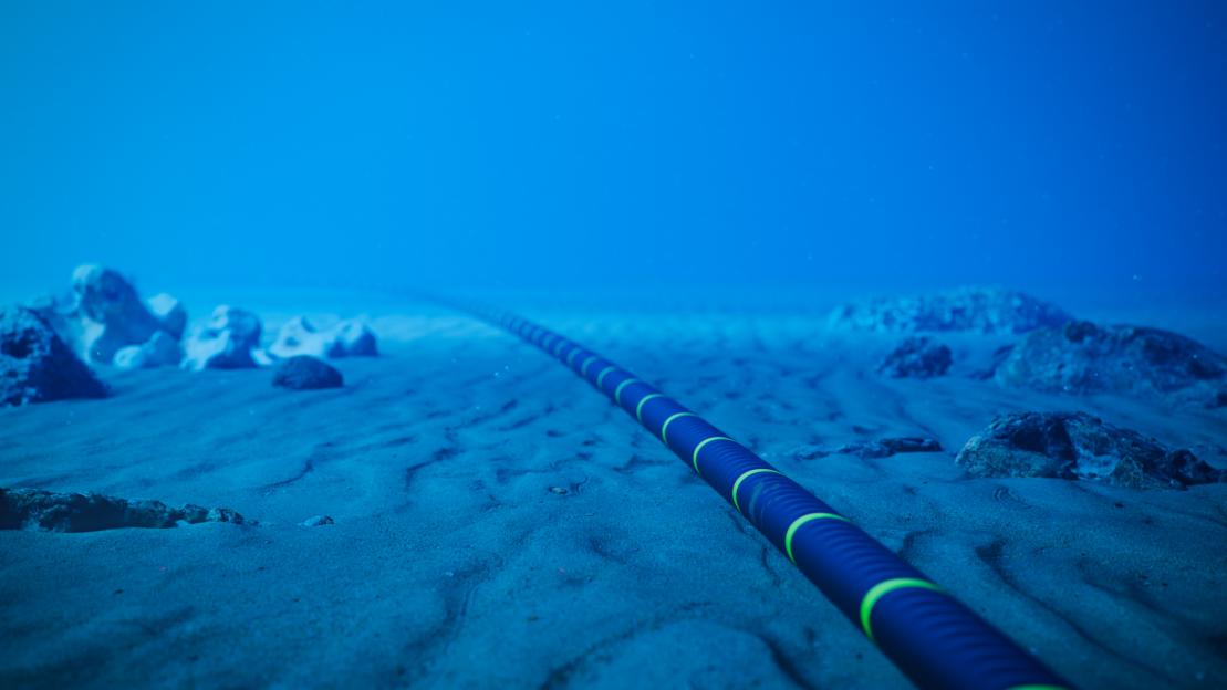 Underwater fiber-optic cable on the ocean floor.